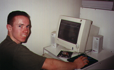 Here's where I spend alot of my time, on the computer 
working on my website and chatting in the SLY chatroom, while listening to the Rocky IV soundtrack!